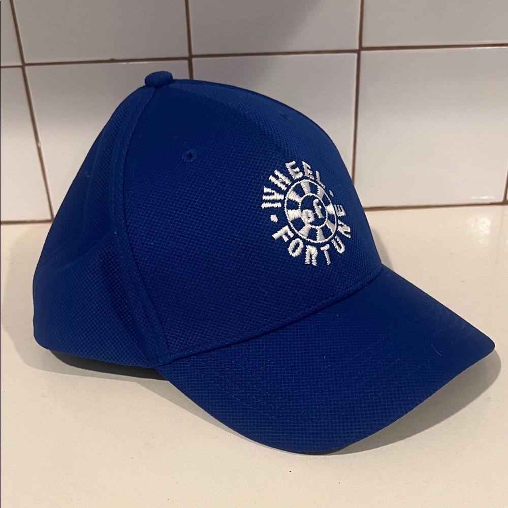 Blue Wheel of Fortune Cap Snap Back Brand New- Never Worn!